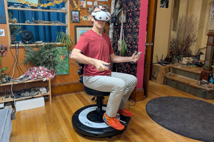 Alan Truly spins in place on a RotoVR Explorer while playing DigVR.