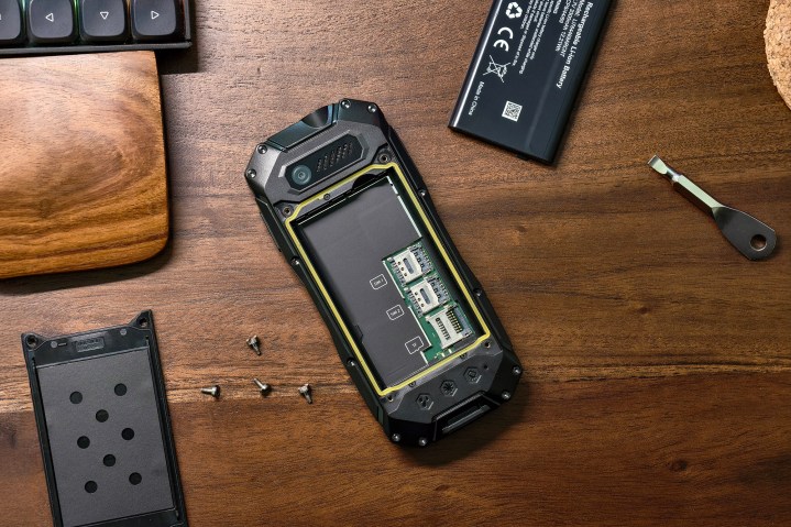 Four screws holding Blackview N1000 rugged phone's back in place.