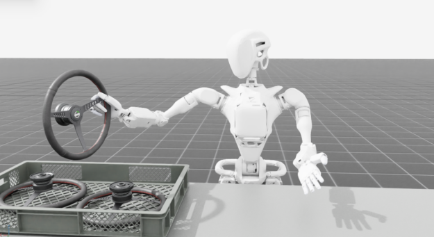 Image shows a humanoid robot on a grid background standing next to a table with two wheels in a tray. The robot is holding a wheel on edge.